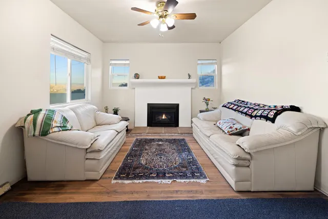 a view of a road with a snow in the background