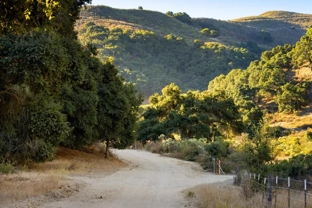 a view of ocean with mountains