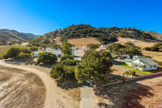 a view of a swimming pool with an outdoor seating
