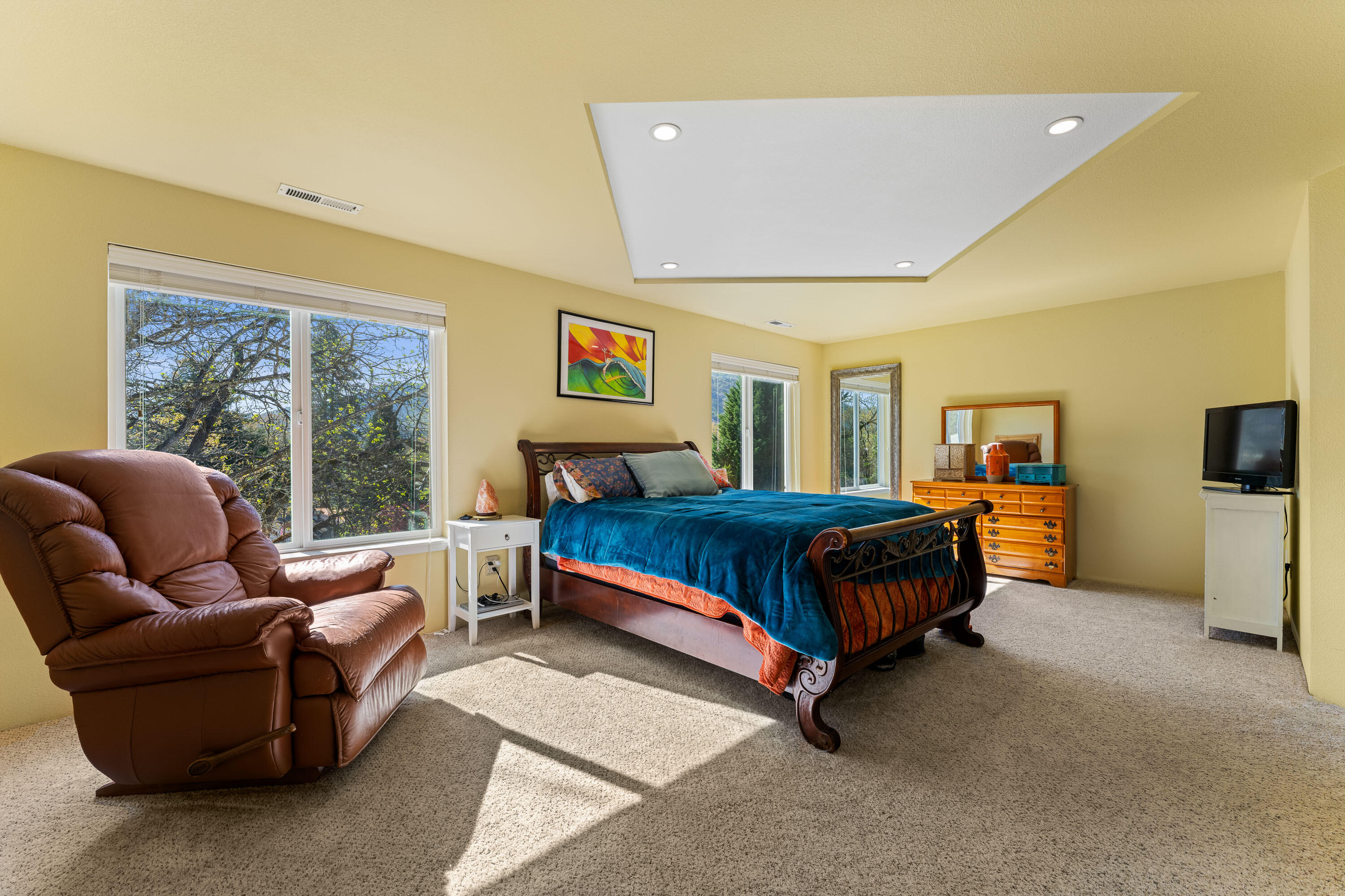 105 Cedar Ridge Terrace Rogue River, OR 97537 - Photo 5 of 23 a bedroom with a bed and a couch