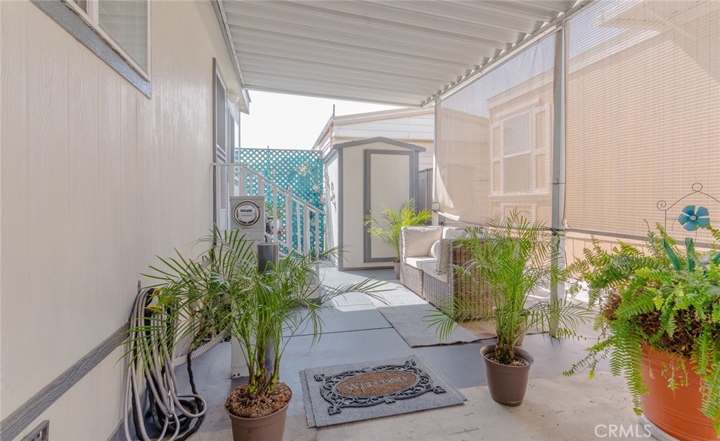 15621 Beach Boulevard Westminster, CA 92683 - Photo 25 of 25 a potted plant sitting in front of a door
