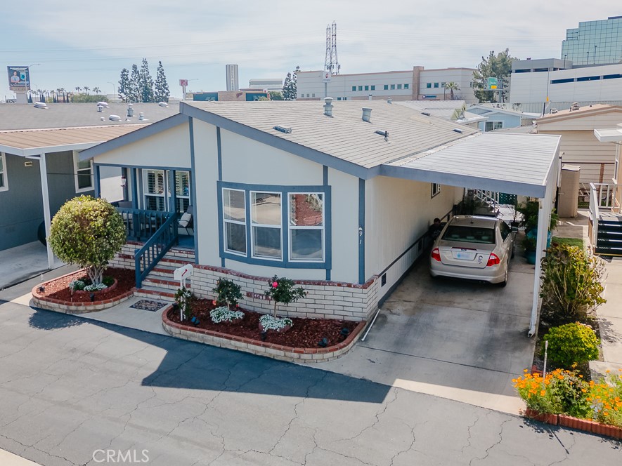 15621 Beach Boulevard Westminster, CA 92683 - Photo 7 of 25 a car parked in front of house