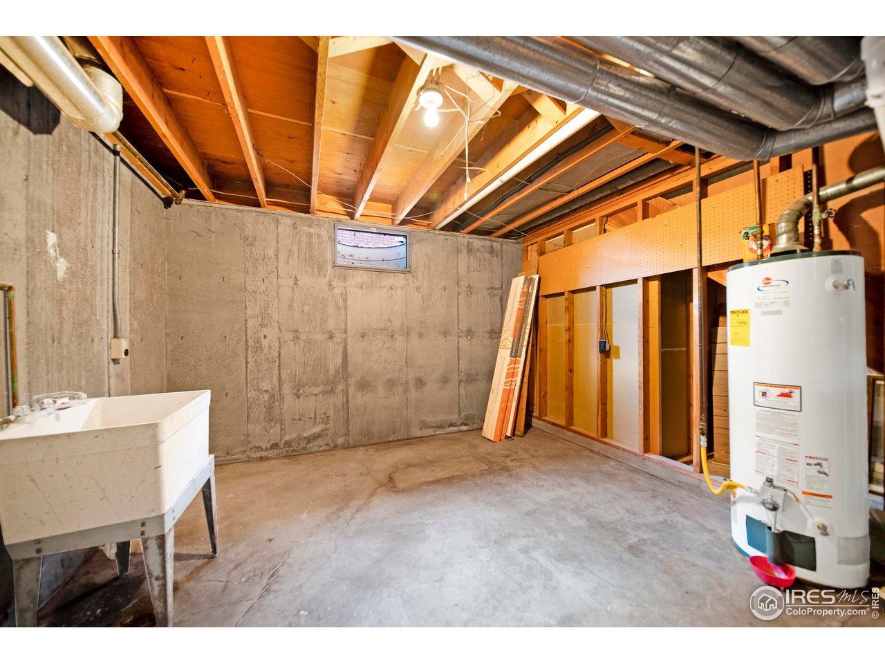 706 Lane Street Fort Morgan, CO 80701 - Photo 23 of 26 Furnace room/basement laundry