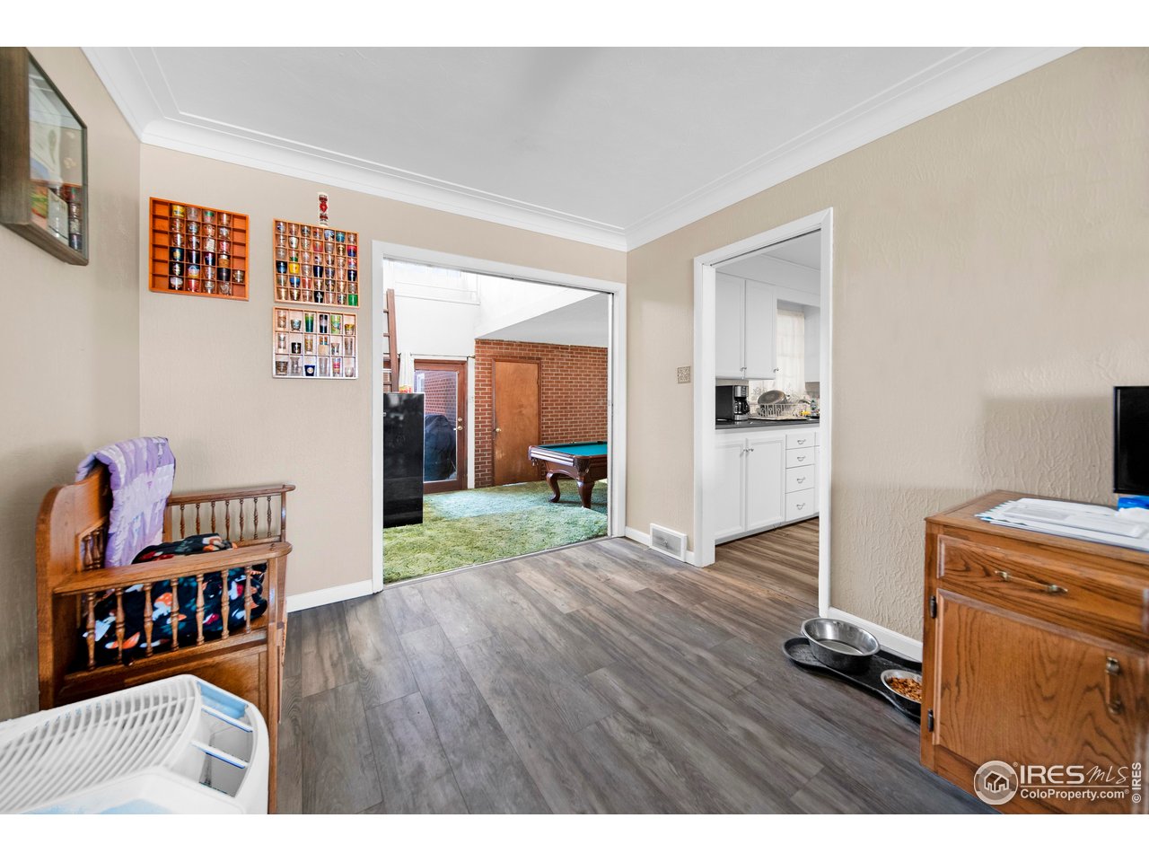 706 Lane Street Fort Morgan, CO 80701 - Photo 8 of 26 Living room looking to kitchen and family room