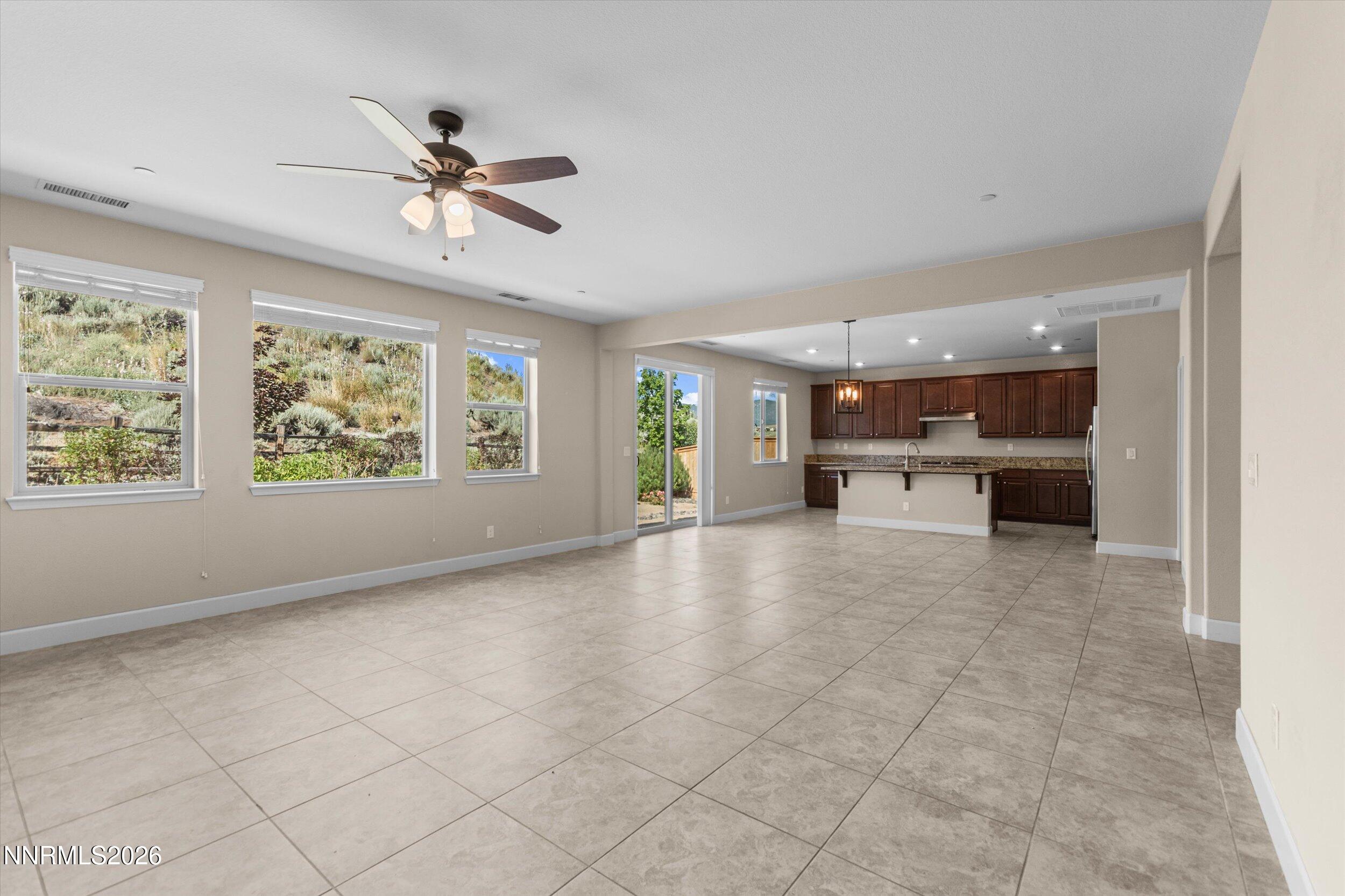 1725 Verdi Vista Court Reno, NV 89523 - Photo 7 of 37 a view of livingroom with hardwood floor and a kitchen