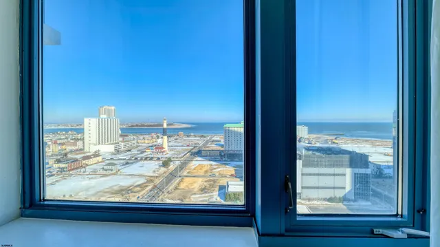 a bathroom with a sink toilet a mirror and shower