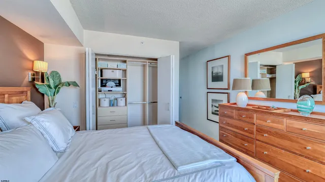 a view of a balcony with furniture and wooden floor