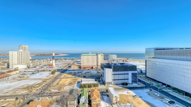 a lobby with furniture and wooden floor