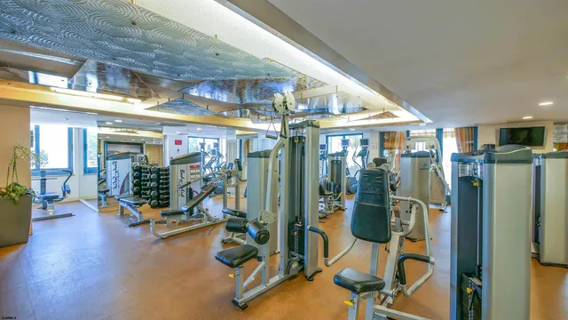 a lobby with furniture and windows