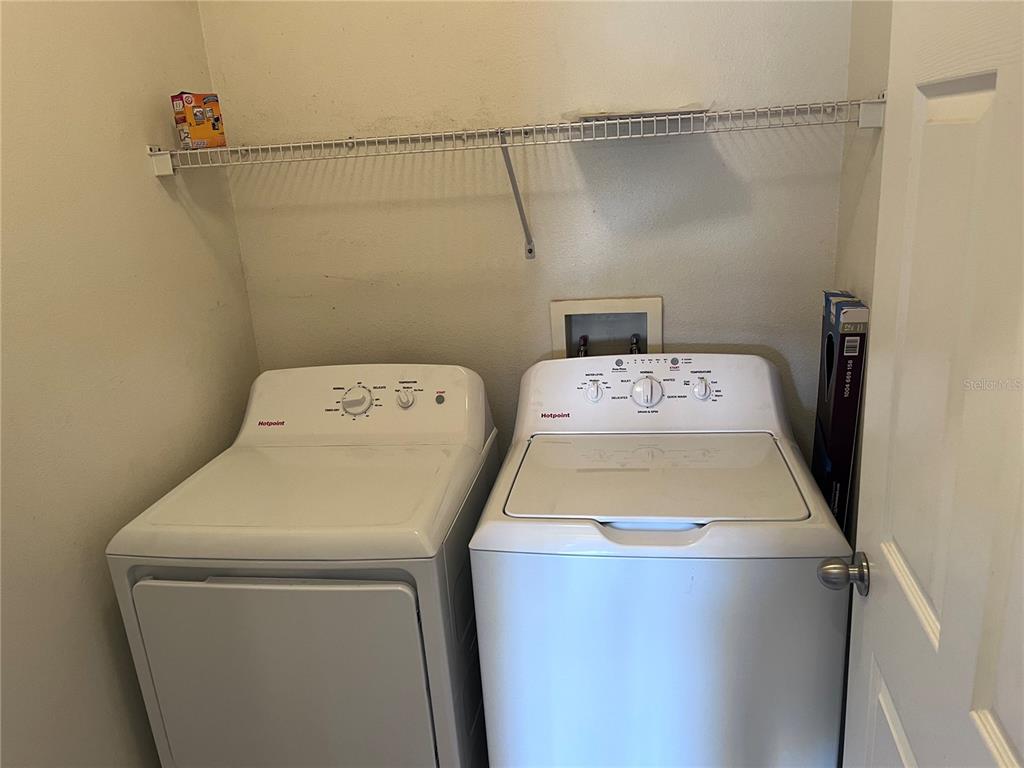 4802 51st Street West, Unit 521 Bradenton, FL 34210 - Photo 11 of 16 a utility room with dryer and washer