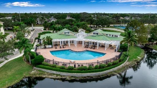 4802 51st Street West, Unit 521 Bradenton, FL 34210 - Photo 16 of 16 an aerial view of a house with outdoor space and a swimming pool