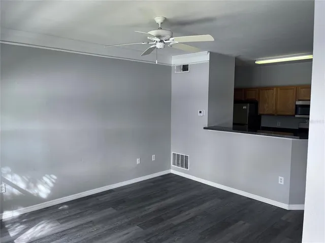 a view of a livingroom with wooden floor
