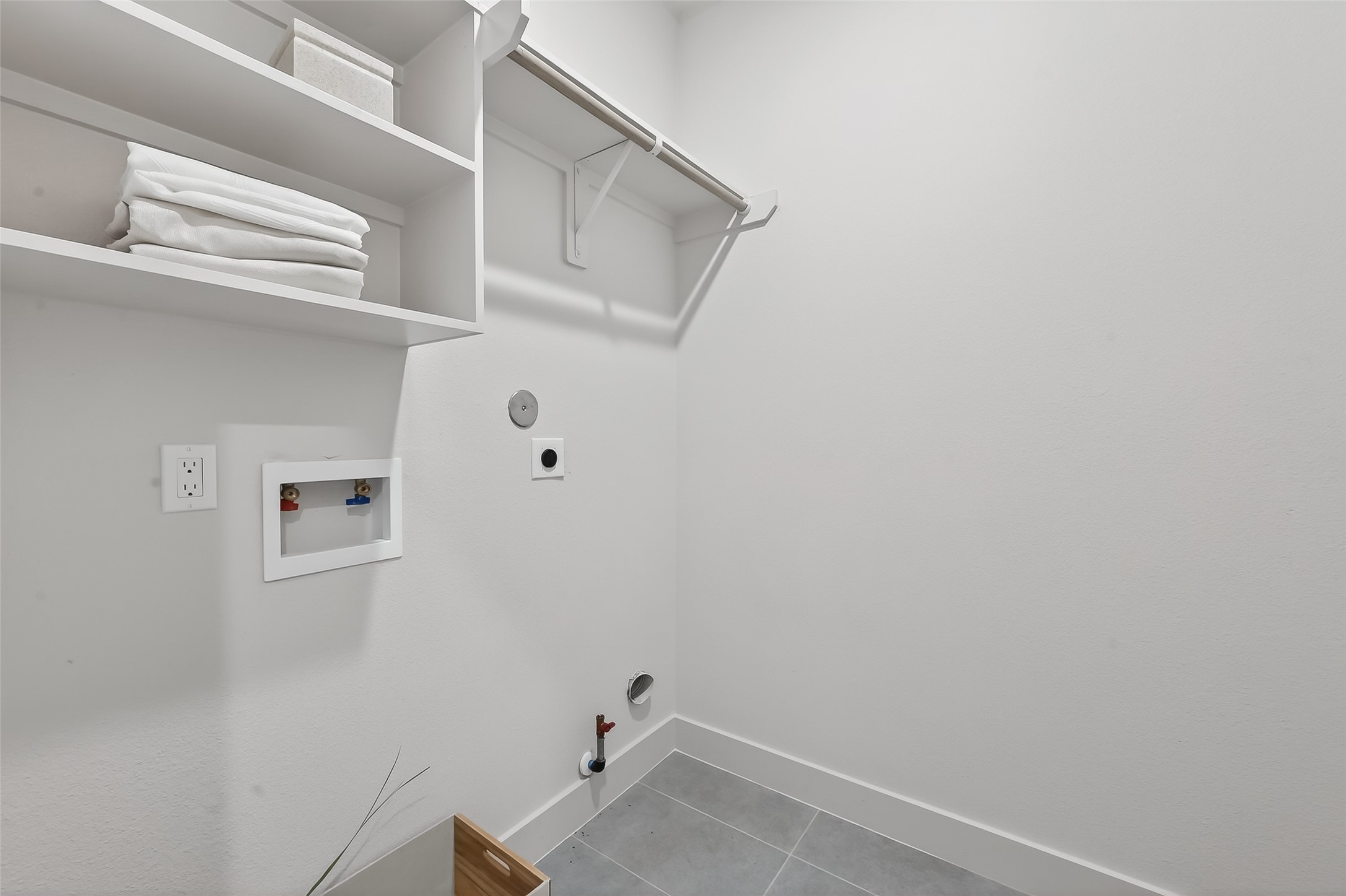 975 Highland Light Lane Houston, TX 77091 - Photo 23 of 41 a view of small space with racks on the wall