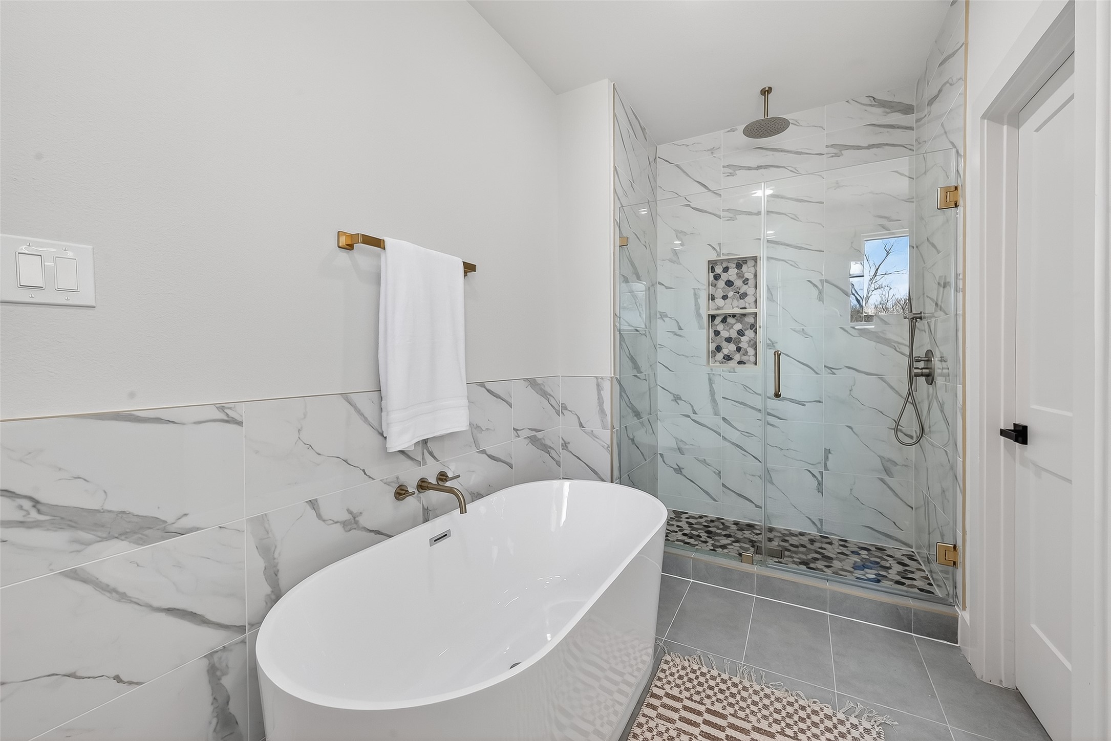 975 Highland Light Lane Houston, TX 77091 - Photo 27 of 41 a bathroom with a bathtub and shower