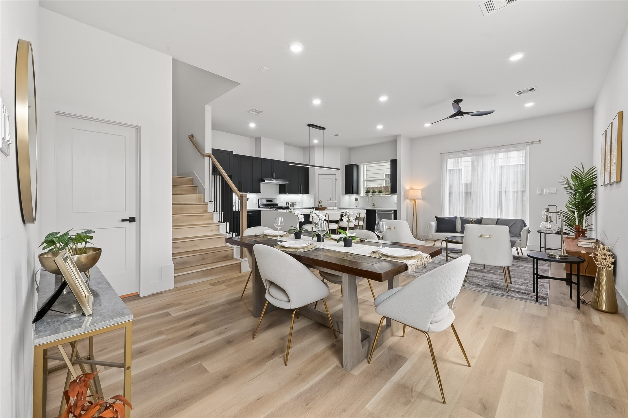 975 Highland Light Lane Houston, TX 77091 - Photo 3 of 41 a view of a dining room with furniture