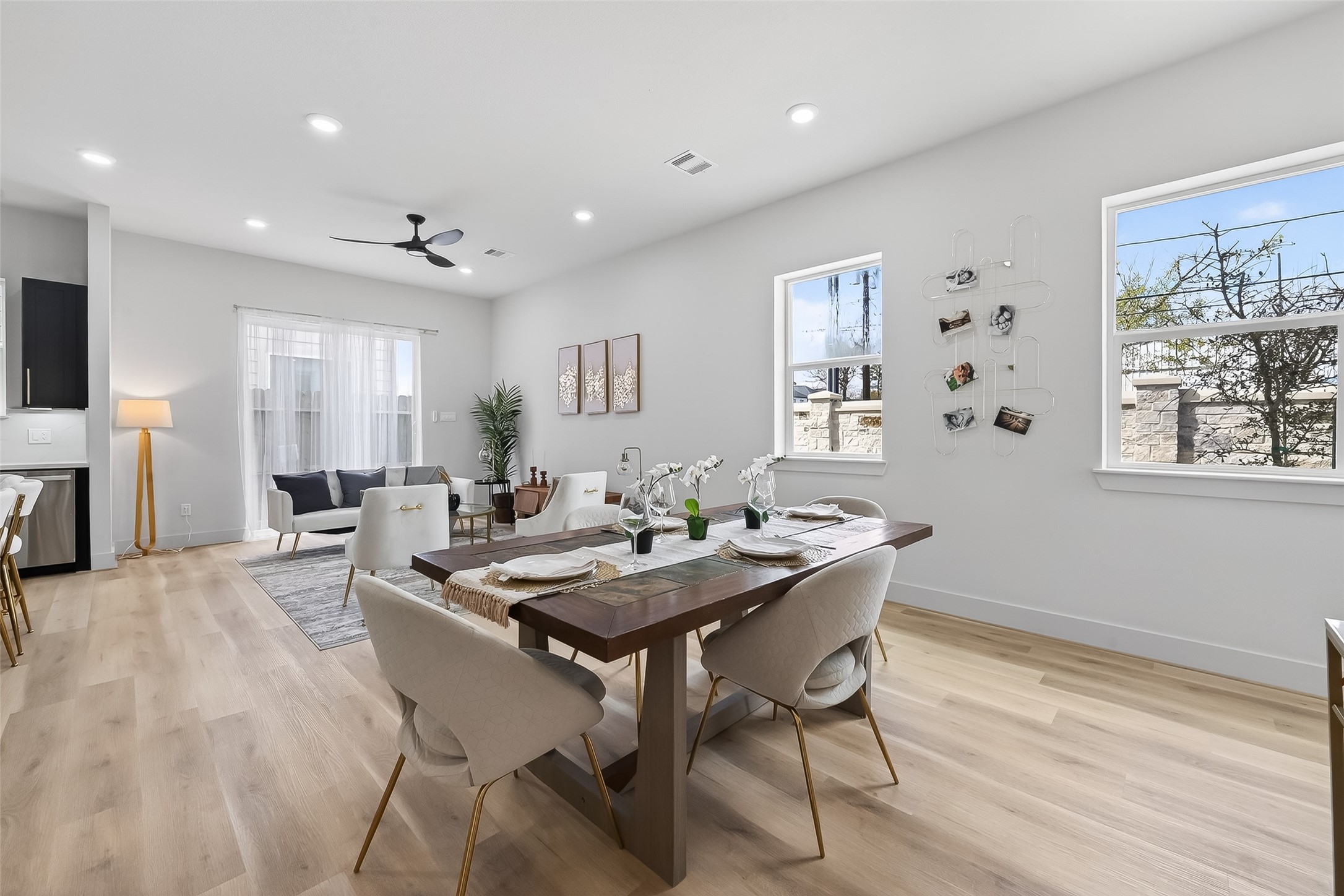 975 Highland Light Lane Houston, TX 77091 - Photo 6 of 41 a view of a dining room with furniture window and wooden floor