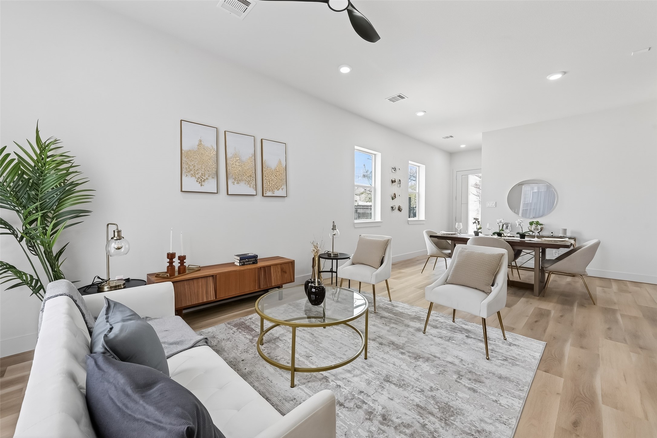 975 Highland Light Lane Houston, TX 77091 - Photo 10 of 41 a living room with furniture and a potted plant