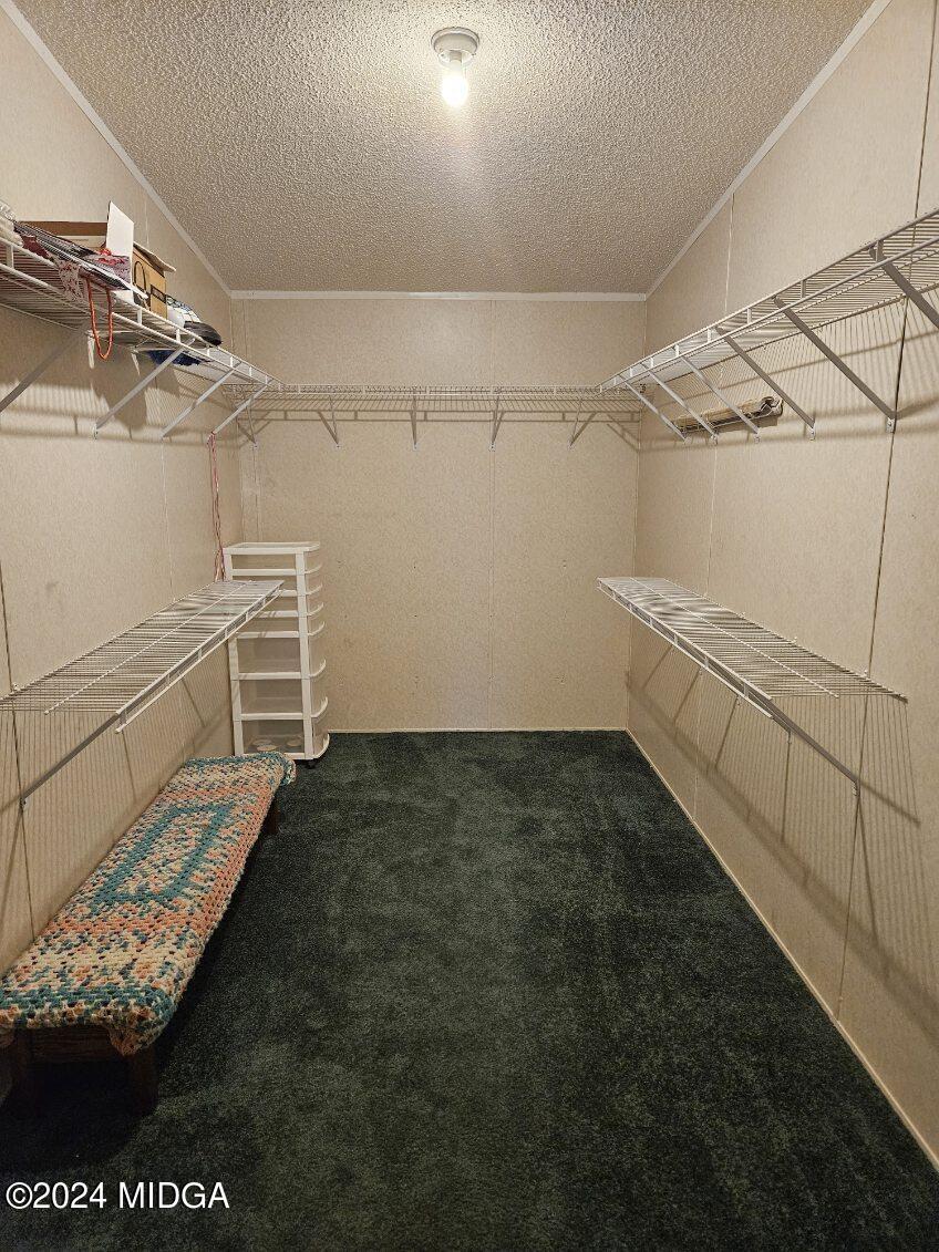 75 Spring Valley Drive Byron, GA 31008 - Photo 20 of 52 a view of a room with racks on the wall