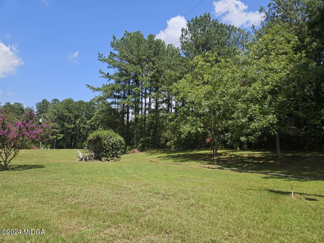 75 Spring Valley Drive Byron, GA 31008 - Photo 48 of 52 a view of outdoor space with deck and yard