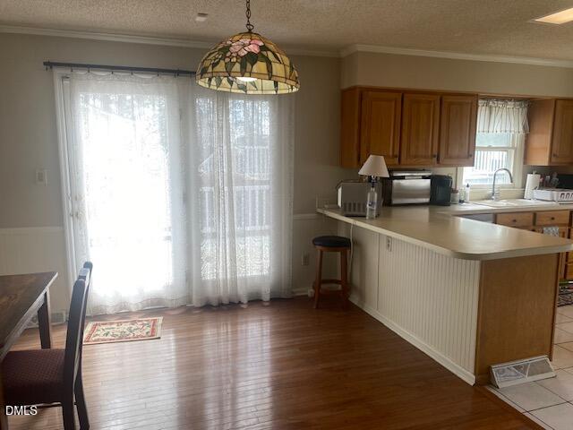 23 South Chaucer Way Kittrell, NC 27544 - Photo 11 of 28 a kitchen with stainless steel appliances granite countertop a sink stove and cabinets