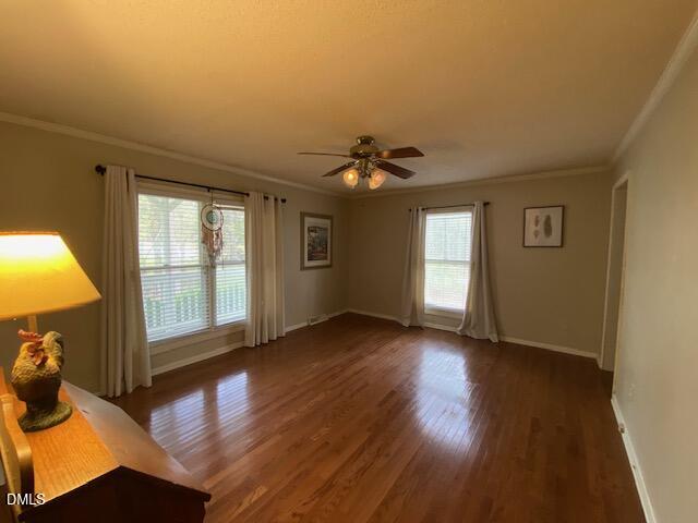 23 South Chaucer Way Kittrell, NC 27544 - Photo 13 of 28 a view of empty room with wooden floor and fan
