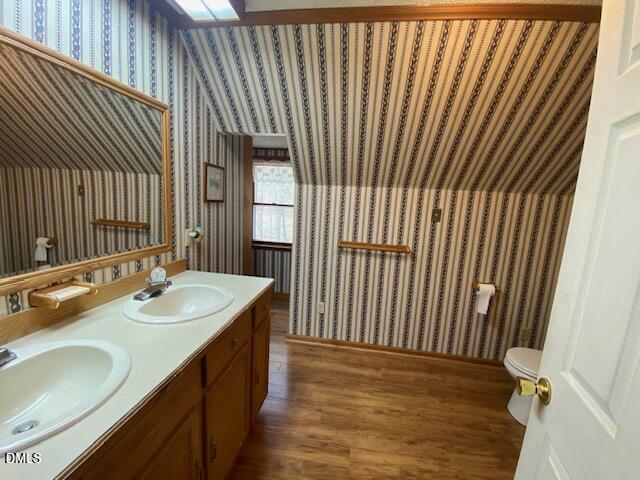 23 South Chaucer Way Kittrell, NC 27544 - Photo 21 of 28 a bathroom with a sink and a mirror