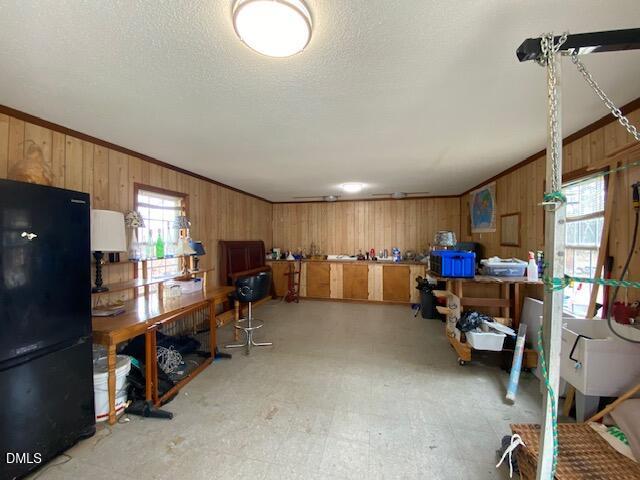 23 South Chaucer Way Kittrell, NC 27544 - Photo 24 of 28 a room with furniture and a flat screen tv