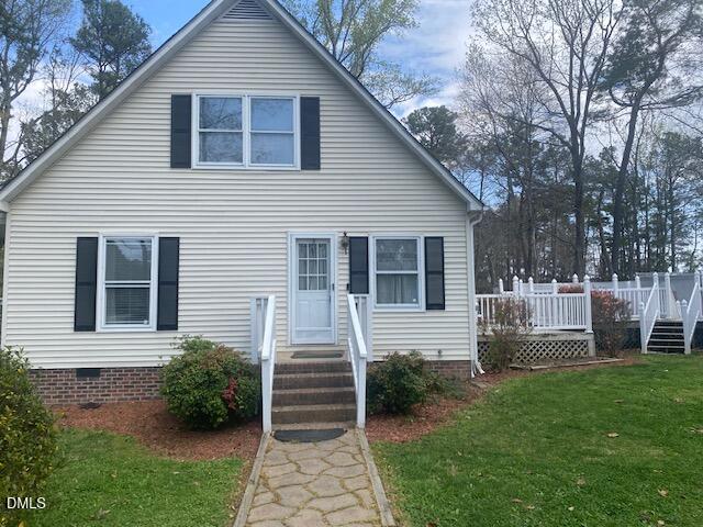 23 South Chaucer Way Kittrell, NC 27544 - Photo 27 of 28 a view of house with backyard