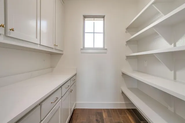 a view of an empty walk in closet