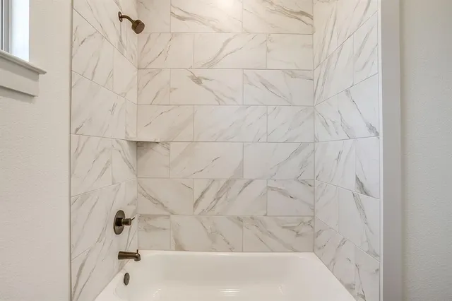 a bathroom with a bathtub