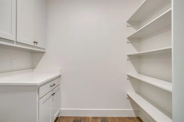 a view of an empty walk in closet