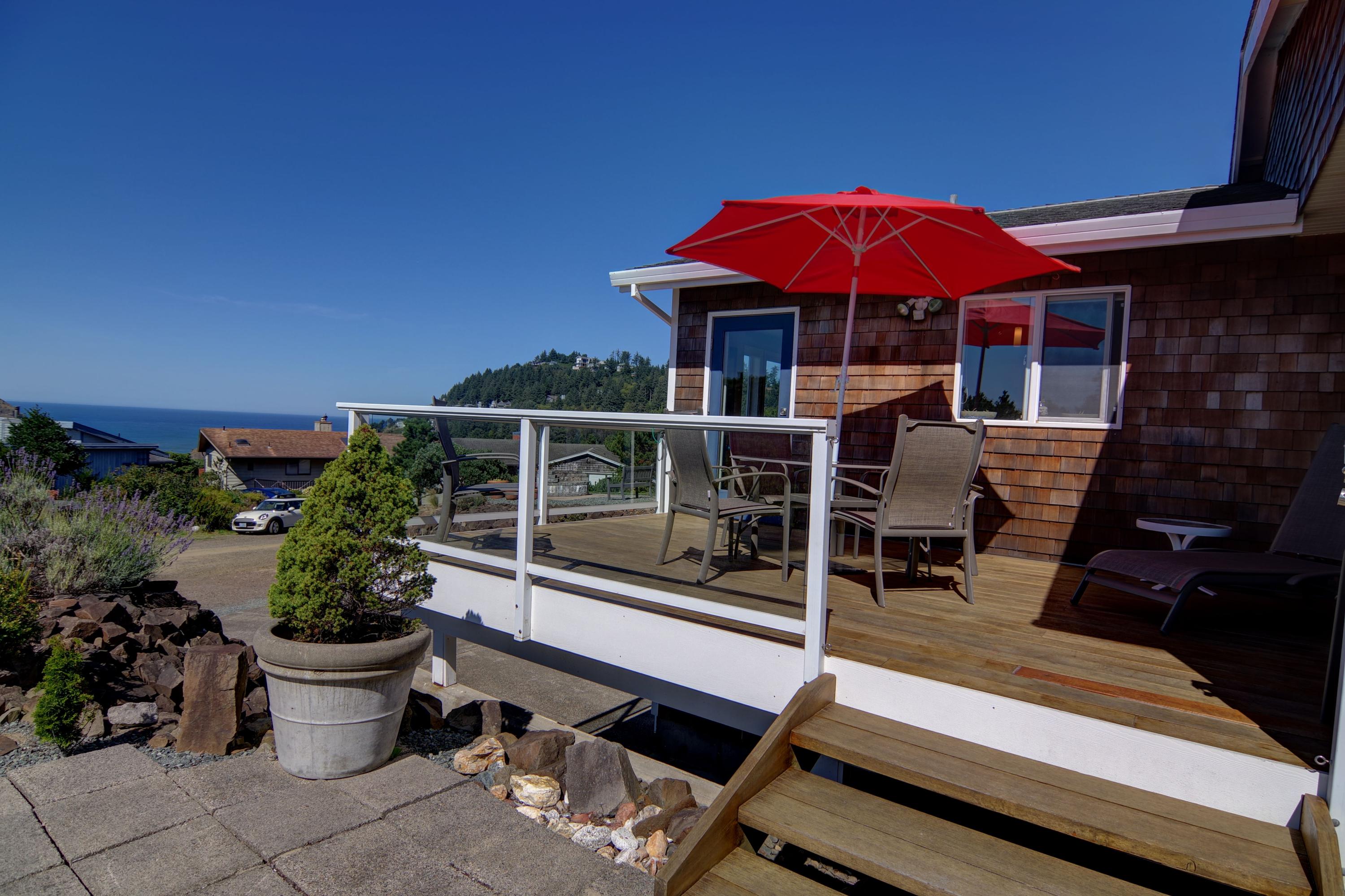 1065 Arthurs Road Oceanside, OR 97141 - Photo 31 of 47 a view of a patio with chairs and potted plants