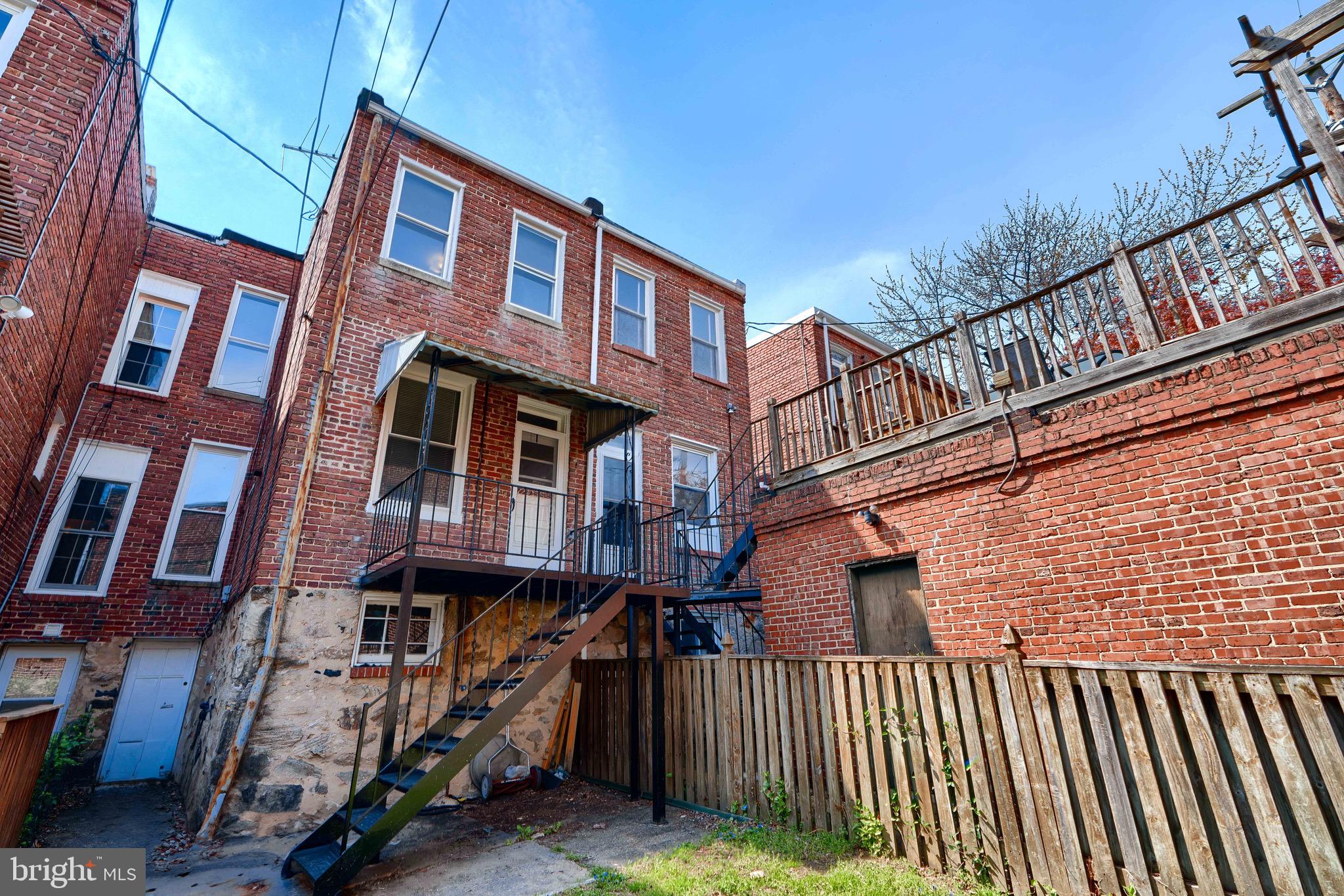 3753 Keswick Road Baltimore, MD 21211 - Photo 36 of 36 a view of a brick building with many windows