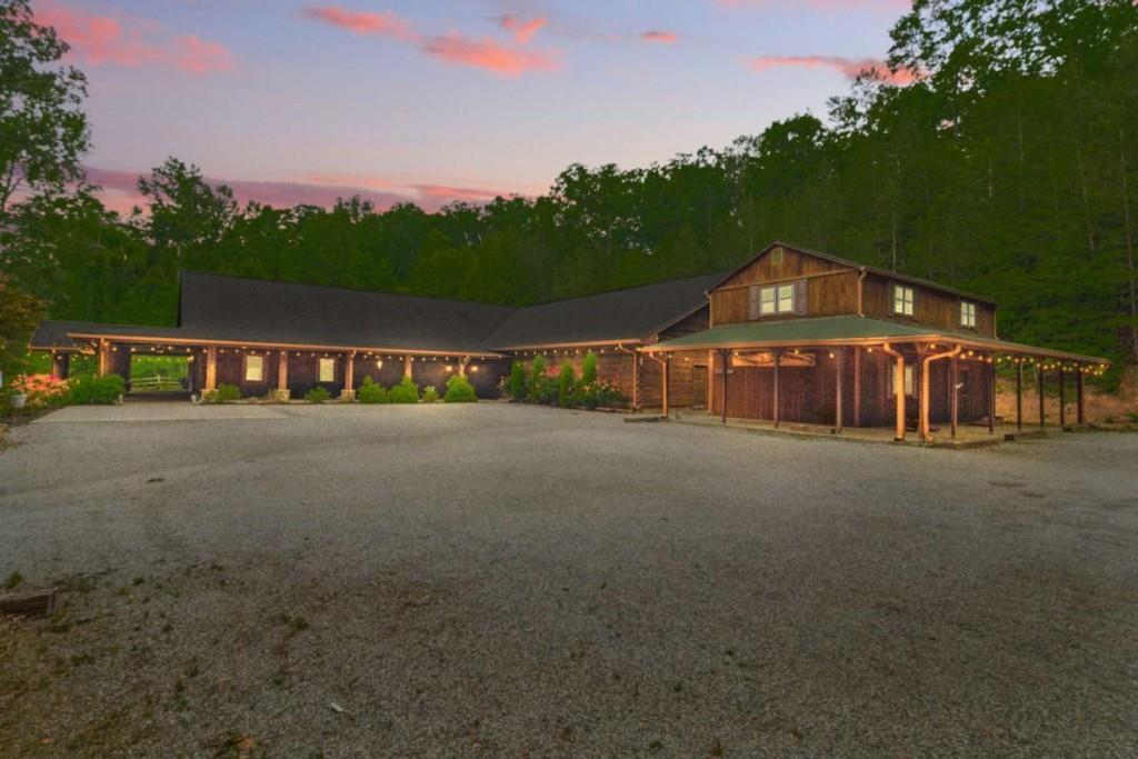 230 Old Mill White Road Jasper, GA 30143 - Photo 18 of 65 a side view of a house with a yard