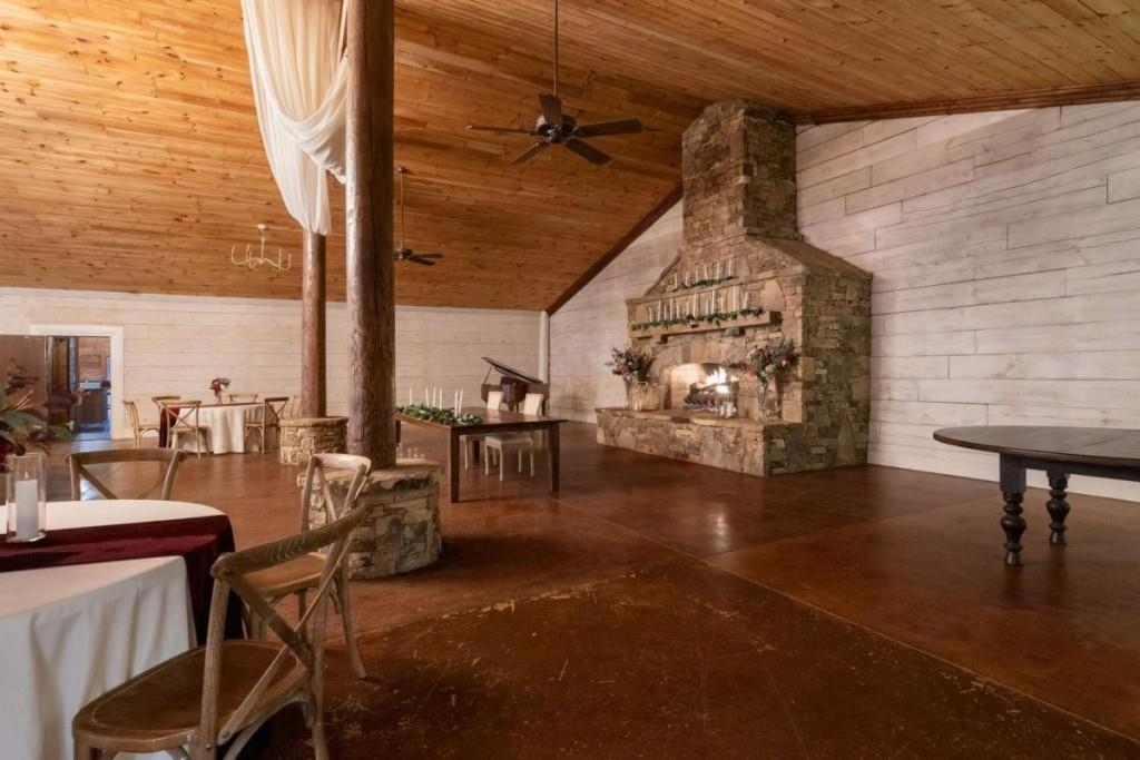 230 Old Mill White Road Jasper, GA 30143 - Photo 19 of 65 a dining room with furniture and a floor to ceiling window