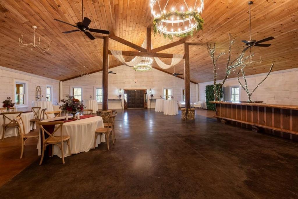 230 Old Mill White Road Jasper, GA 30143 - Photo 20 of 65 a living room with couches and balcony with wooden floor