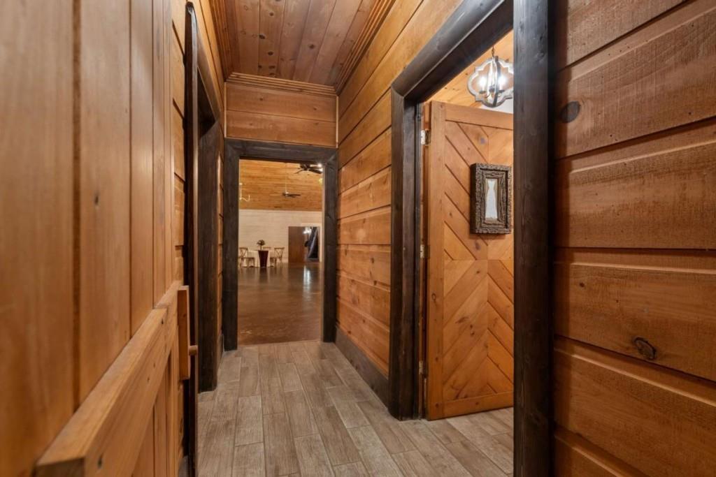 230 Old Mill White Road Jasper, GA 30143 - Photo 29 of 65 a view of a hallway with wooden floor and door