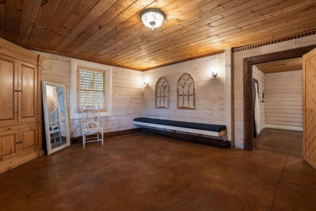 230 Old Mill White Road Jasper, GA 30143 - Photo 38 of 65 a room with furniture and a window