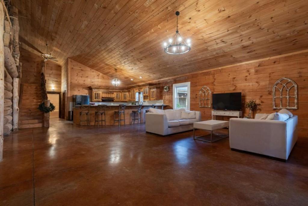 230 Old Mill White Road Jasper, GA 30143 - Photo 40 of 65 a living room with furniture and a flat screen tv