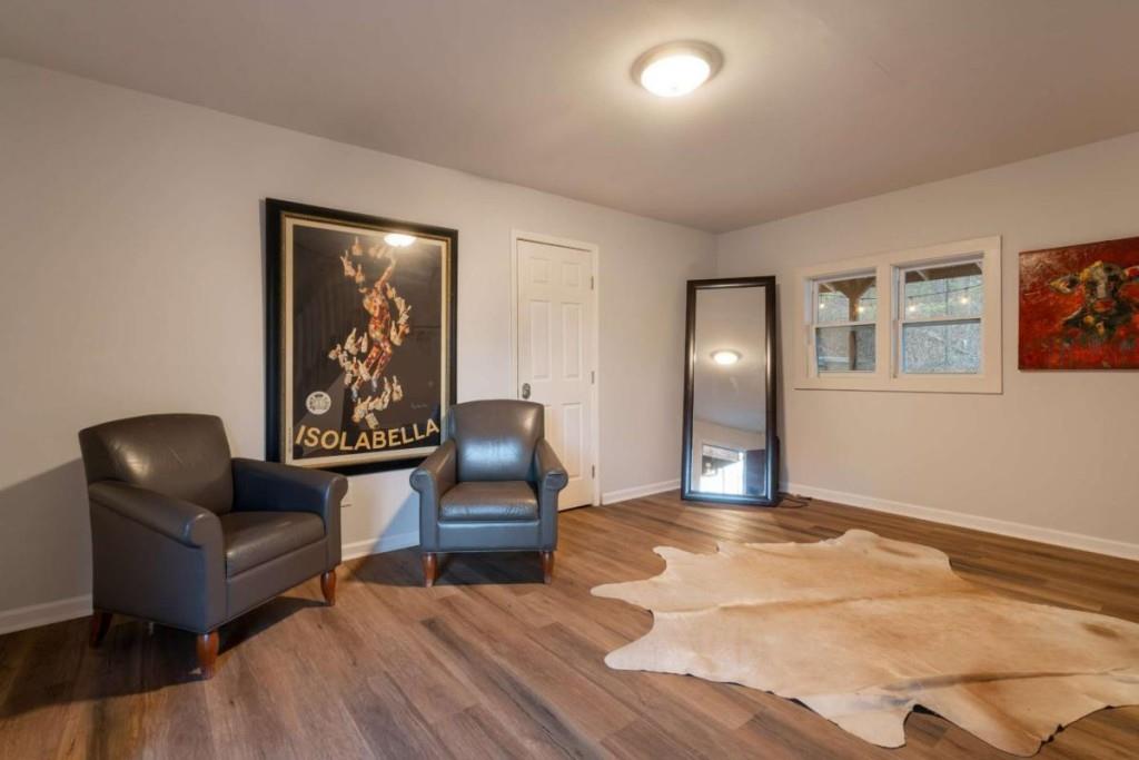 230 Old Mill White Road Jasper, GA 30143 - Photo 45 of 65 a living room with furniture and wooden floor