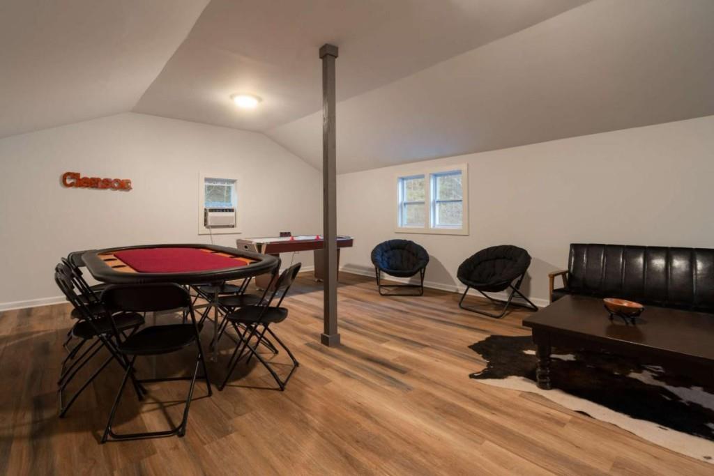 230 Old Mill White Road Jasper, GA 30143 - Photo 47 of 65 a view of a dining room with furniture and wooden floor