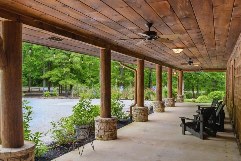 230 Old Mill White Road Jasper, GA 30143 - Photo 56 of 65 a living room with patio furniture and a garden