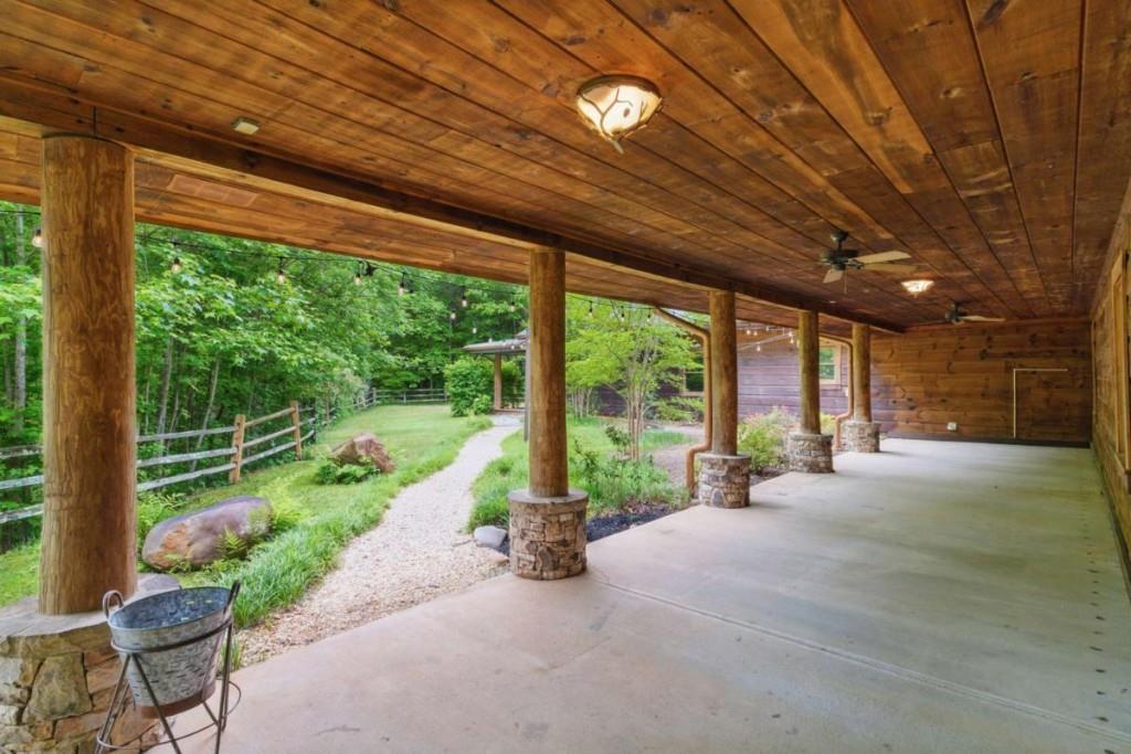 230 Old Mill White Road Jasper, GA 30143 - Photo 57 of 65 a view of a house with backyard and porch