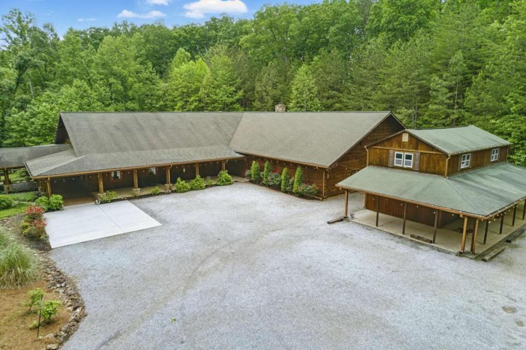 230 Old Mill White Road Jasper, GA 30143 - Photo 63 of 65 an aerial view of a house with a yard and tree s