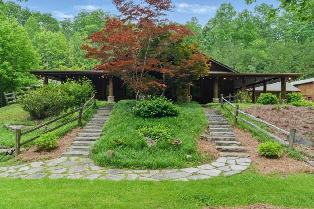 230 Old Mill White Road Jasper, GA 30143 - Photo 10 of 65 a view of a backyard with wooden fence