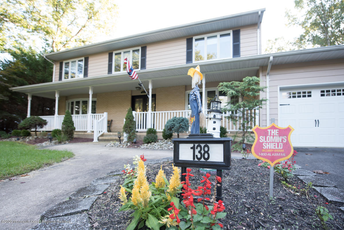 a front view of a house with patio
