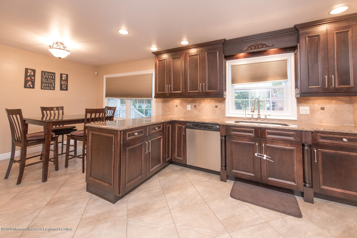 138 Frank Applegate Road Jackson, NJ 08527 - Photo 17 of 47 a kitchen with a sink window and cabinets