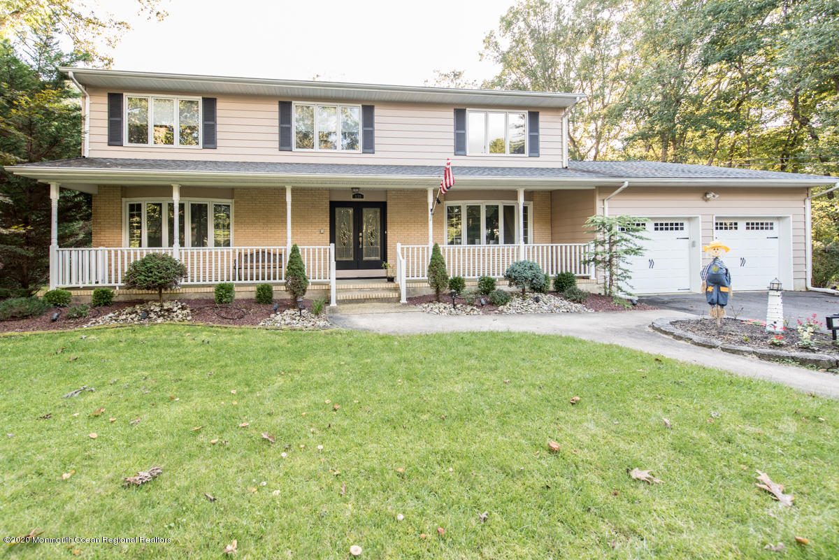 138 Frank Applegate Road Jackson, NJ 08527 - Photo 2 of 47 a front view of a house with sitting space and garden