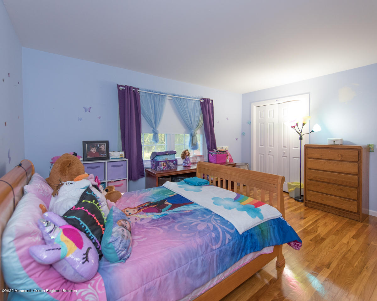 138 Frank Applegate Road Jackson, NJ 08527 - Photo 27 of 47 a bed room with a bed and a window