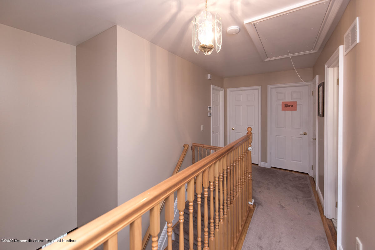 138 Frank Applegate Road Jackson, NJ 08527 - Photo 39 of 47 a view of a hallway to a big room